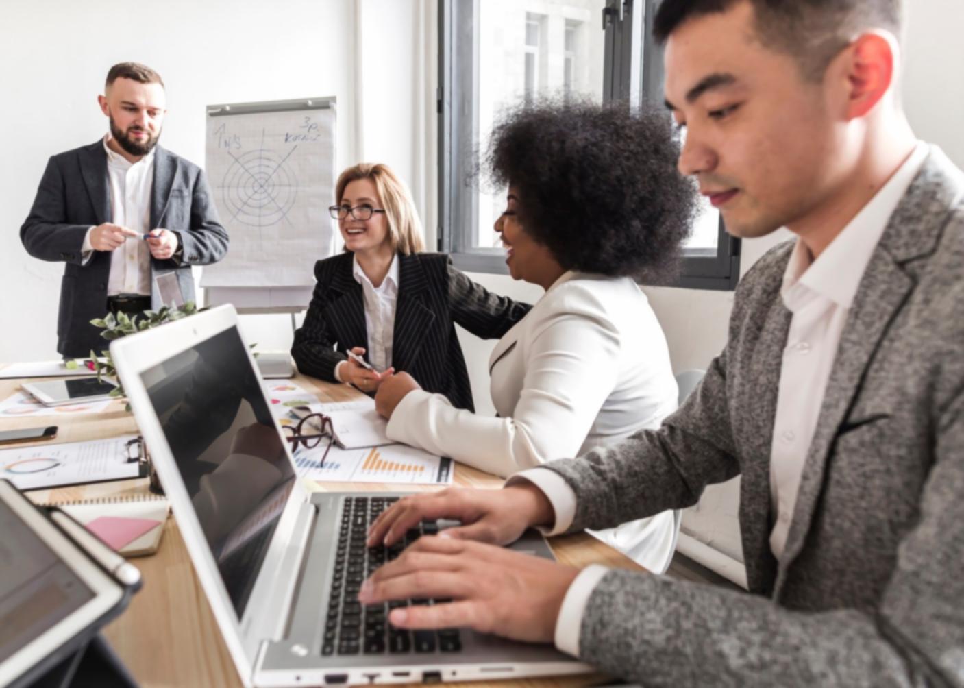 Strategic business planning session with financial documents and growth charts